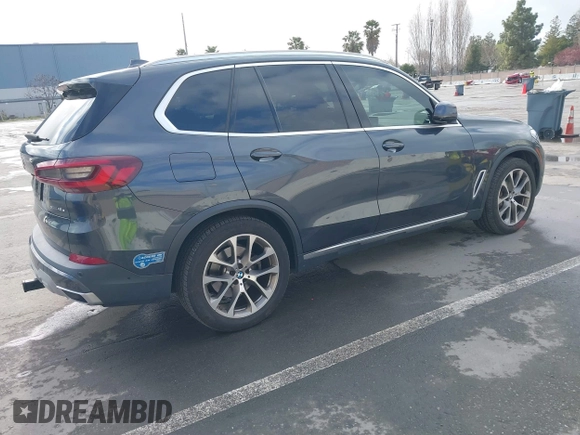 2021 BMW X5 xDrive45e with VIN 5UXTA6C09M9D26035, listed as a IAAI auction lot 41788981 with 60,571 mi miles and . Bid and sale history available at DreamBid. Image 4.