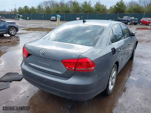 2013 Volkswagen Passat SE w/Sunroof with VIN 1VWBH7A38DC002096, listed as a IAAI auction lot 41904594 with 134,738 mi miles. Bid and sale history available at carsss.com. Image 4.