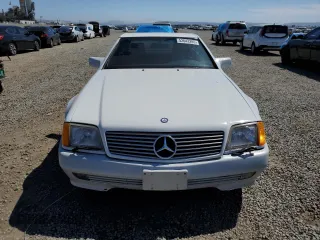 1992 Mercedes-Benz 500 z VIN WDBFA66E7NF049079, wystawiony jako Copart lot #52642285 z przebiegiem 69 976 mil mil oraz Szkody całkowita. Historia ofert i sprzedaży dostępna na DreamBid. Obrazek 5.