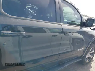 2021 Ram 1500 Laramie z VIN 1C6SRFJT4MN799792, wystawiony jako IAAI lot #41838329 z przebiegiem 106 968 mil mil oraz . Historia ofert i sprzedaży dostępna na DreamBid. Obrazek 13.