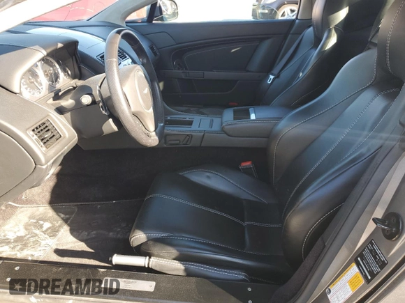 2014 Aston Martin Vantage z VIN SCFEKBBK3EGD18661, wystawiony jako Copart lot #86366204 z przebiegiem 14 863 mil mil oraz Szkoda całkowita • Salvage title. Historia ofert i sprzedaży dostępna na DreamBid. Obrazek 7.