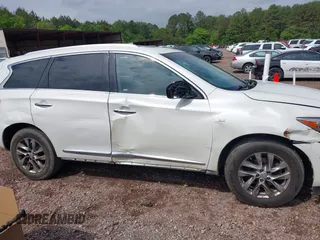 2015 Infiniti QX60 with VIN 5N1AL0MNXFC547099, listed as a IAAI auction lot 42104864 with 128,834 mi miles and . Bid and sale history available at DreamBid. Image 13.