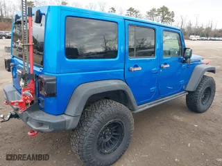 2016 Jeep Wrangler Unlimited Rubicon with VIN 1C4BJWFG2GL192074, listed as a IAAI auction lot 41598861 with 70,000 mi miles. Bid and sale history available at carsss.com. Image 4.