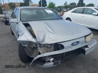 1994 Ford Taurus GL z VIN 1FALP5240RA222573, wystawiony jako IAAI lot #41845381 z przebiegiem 114 401 mil mil oraz . Historia ofert i sprzedaży dostępna na DreamBid. Obrazek 1.