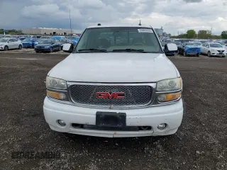 2005 GMC Sierra Denali z VIN 2GTEK63NX51184417, wystawiony jako Copart lot #55663955 z przebiegiem 201 401 mil mil oraz Tytuł czysty. Historia ofert i sprzedaży dostępna na DreamBid. Obrazek 5.