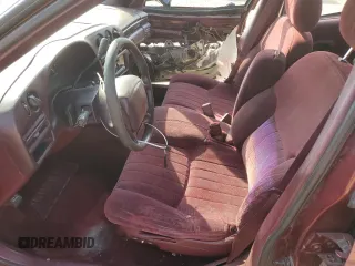 1996 Chevrolet Lumina with VIN 2G1WL52M7T9148079, listed as a Copart auction lot 75500834 with 176,307 mi miles and Salvage Title. Bid and sale history available at DreamBid. Image 7.