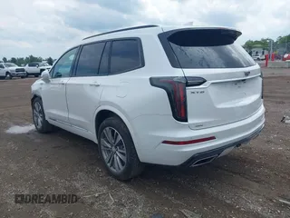 2020 Cadillac XT6 AWD Sport with VIN 1GYKPGRS0LZ140979, listed as a IAAI auction lot 42719794 with 111,420 mi miles and . Bid and sale history available at DreamBid. Image 3.