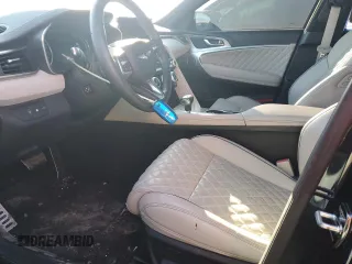 2022 Genesis G70 3.3T z VIN KMTG54TE0NU103581, wystawiony jako Copart lot #46139865 z przebiegiem 43 493 mil mil oraz Szkoda całkowita • Salvage title. Historia ofert i sprzedaży dostępna na DreamBid. Obrazek 7.