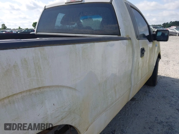 2013 Ford F-150 XL with VIN 1FTMF1CMXDKE37423, listed as a IAAI auction lot 42261679 with 185,759 mi miles and . Bid and sale history available at DreamBid. Image 6.