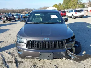 2021 Jeep Grand Cherokee 80th Anniversary z VIN 1C4RJFBG5MC737412, wystawiony jako IAAI lot #41753550 z przebiegiem 54 921 mil mil oraz . Historia ofert i sprzedaży dostępna na DreamBid. Obrazek 12.