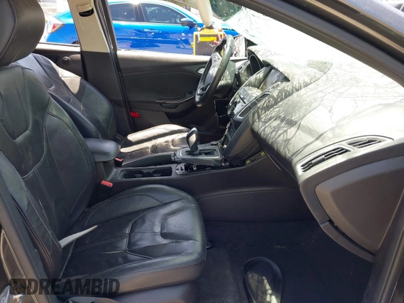 2015 Ford Focus Titanium with VIN 1FADP3N27FL380525, listed as a IAAI auction lot 42493542 with 86,423 mi miles and . Bid and sale history available at DreamBid. Image 5.