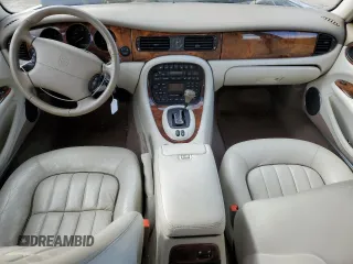 2003 Jaguar XJ 8 z VIN SAJDA14C13LF51313, wystawiony jako Copart lot #42750105 z przebiegiem Nie podano mil oraz Czysty tytuł • Clean title. Historia ofert i sprzedaży dostępna na DreamBid. Obrazek 8.