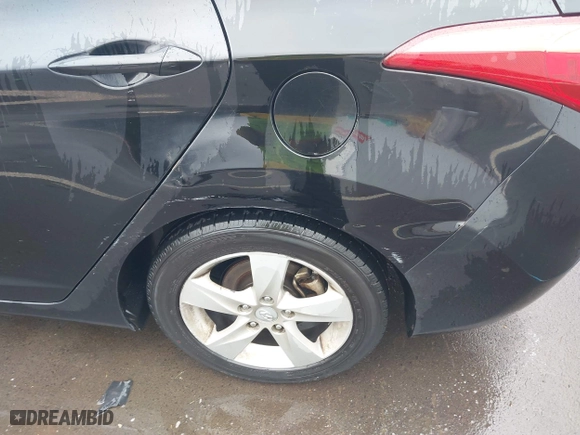 2012 Hyundai Elantra GLS with VIN KMHDH4AE8CU404698, listed as a IAAI auction lot 41988964 with 1 mi miles. Bid and sale history available at carsss.com. Image 6.