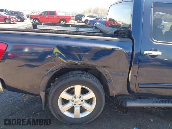 2011 Nissan Titan SV with VIN 1N6BA0ED7BN311347, listed as a IAAI auction lot 41634291 with 116,424 mi miles and . Bid and sale history available at DreamBid. Image 6.