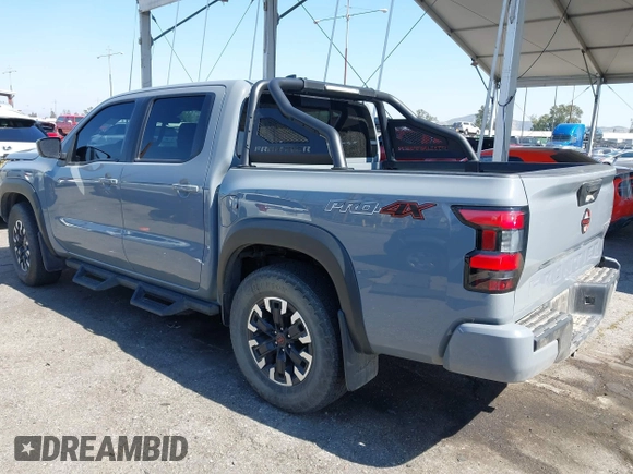 2023 Nissan Frontier Pro-4X z VIN 1N6ED1EKXPN641323, wystawiony jako IAAI lot #42227180 z przebiegiem 25 199 mil mil oraz . Historia ofert i sprzedaży dostępna na DreamBid. Obrazek 3.