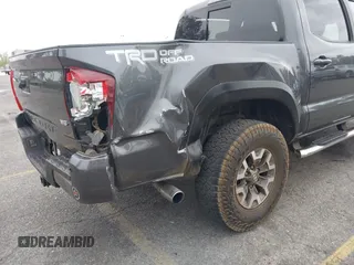 2018 Toyota Tacoma SR5 with VIN 3TMAZ5CN1JM071396, listed as a IAAI auction lot 42061640 with 122,148 mi miles and . Bid and sale history available at DreamBid. Image 6.