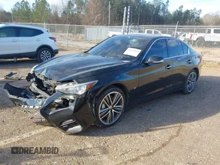 2015 Infiniti Q50 Premium with VIN JN1BV7AR5FM418350, listed as a IAAI auction lot 41622894 with 135,478 mi miles and . Bid and sale history available at carsss.com. Image 2.