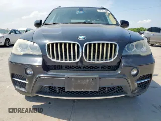 2012 BMW X5 35d with VIN 5UXZW0C57CL664245, listed as a Copart auction lot 58356885 with 148,517 mi miles and Clean title. Bid and sale history available at DreamBid. Image 5.