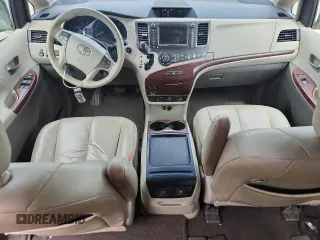2011 Toyota Sienna XLE AAS с VIN 5TDYK3DC1BS017540, выставлен на аукционе Copart как лот 65177255 с пробегом 164 604 миль миль и Списание • Salvage title. История ставок и продаж доступна на DreamBid. Изображение 8.