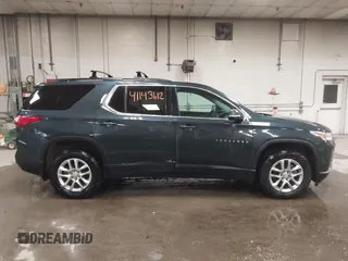 2020 Chevrolet Traverse LT with VIN 1GNEVHKW5LJ203804, listed as a IAAI auction lot 41143612 with 93,947 mi miles and . Bid and sale history available at DreamBid. Image 13.