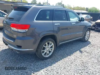 2014 Jeep Grand Cherokee Summit с VIN 1C4RJEJGXEC299600, выставлен на аукционе IAAI как лот 41935193 с пробегом 199 831 миль миль и . История ставок и продаж доступна на DreamBid. Изображение 4.