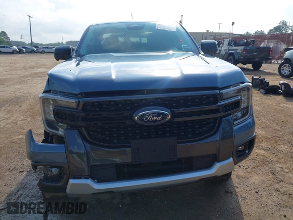 2024 Ford Ranger XLT z VIN 1FTER4GH0RLE15572, wystawiony jako IAAI lot #42138297 z przebiegiem 6 624 mil mil oraz . Historia ofert i sprzedaży dostępna na DreamBid. Obrazek 13.