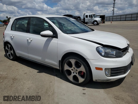 2011 Volkswagen GTI PZEV z VIN WVWHD7AJ2BW174241, wystawiony jako Copart lot #56940305 z przebiegiem 112 705 mil mil oraz Szkoda całkowita • Salvage title. Historia ofert i sprzedaży dostępna na DreamBid. Obrazek 4.