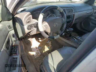 2003 Mercury Sable LS with VIN 1MEHM55S73A619013, listed as a Copart auction lot 73504154 with 200,135 mi miles and Salvage Title. Bid and sale history available at DreamBid. Image 8.
