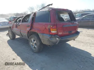 2004 Jeep Grand Cherokee Laredo z VIN 1J4GW48S34C289321, wystawiony jako IAAI lot #42062819 z przebiegiem Nie podano mil oraz . Historia ofert i sprzedaży dostępna na DreamBid. Obrazek 3.