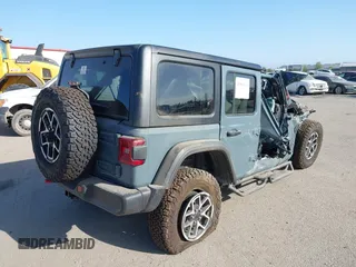 2024 Jeep Wrangler Rubicon with VIN 1C4PJXFG1RW335531, listed as a IAAI auction lot 40800569 with Not Provided miles. Bid and sale history available at carsss.com. Image 4.