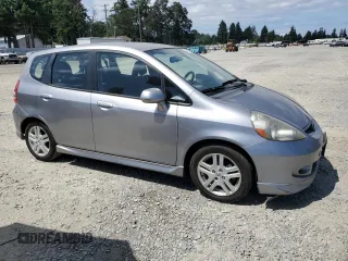 2007 Honda Fit Sport with VIN JHMGD37617S043208, listed as a Copart auction lot 64594825 with 210,672 mi miles and Clean title. Bid and sale history available at DreamBid. Image 4.