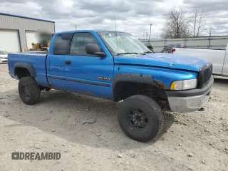 2001 Dodge 2500 z VIN 1B7KF236X1J198956, wystawiony jako Copart lot #52945405 z przebiegiem 216 448 mil mil oraz Czysty tytuł • Clean title. Historia ofert i sprzedaży dostępna na DreamBid. Obrazek 4.