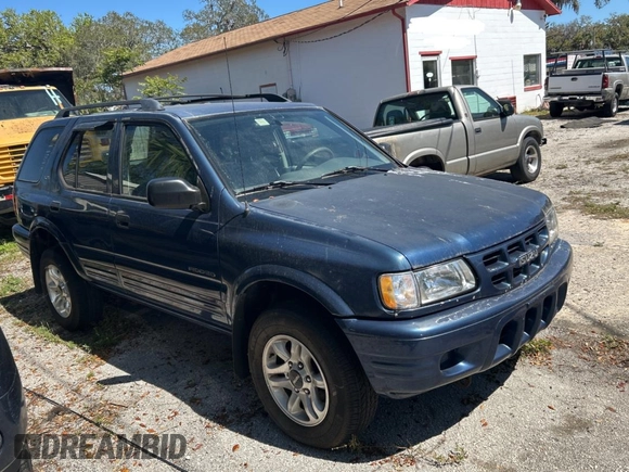2002 Isuzu Rodeo S z VIN 4S2CK58W124324362, wystawiony jako Copart lot #49668045 z przebiegiem Nie podano mil oraz Czysty tytuł • Clean title. Historia ofert i sprzedaży dostępna na DreamBid. Obrazek 1.