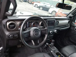 2019 Jeep Wrangler Unlimited Sport S с VIN 1C4HJXDG6KW571640, выставлен на аукционе IAAI как лот 42299078 с пробегом 51 928 миль миль и . История ставок и продаж доступна на DreamBid. Изображение 19.