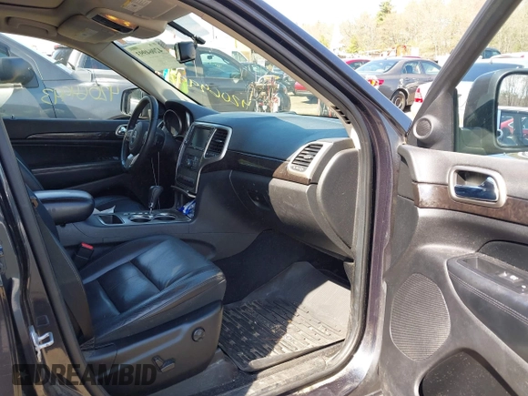 2013 Jeep Grand Cherokee Laredo with VIN 1C4RJFAG1DC592371, listed as a IAAI auction lot 42064993 with 136,154 mi miles. Bid and sale history available at carsss.com. Image 5.