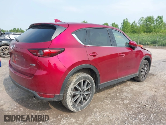 2018 Mazda CX-5 Grand Touring with VIN JM3KFBDM2J0448555, listed as a IAAI auction lot 42449282 with 65,770 mi miles and . Bid and sale history available at DreamBid. Image 4.
