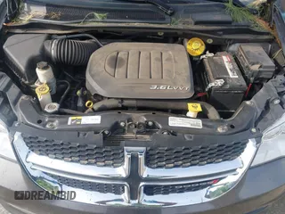 2017 Dodge Grand Caravan SE Plus z VIN 2C4RDGBGXHR549334, wystawiony jako IAAI lot #42097288 z przebiegiem 60 896 mil mil oraz . Historia ofert i sprzedaży dostępna na DreamBid. Obrazek 10.