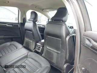 2016 Ford Fusion SE z VIN 3FA6P0HD9GR164473, wystawiony jako IAAI lot #42321315 z przebiegiem 120 005 mil mil oraz . Historia ofert i sprzedaży dostępna na DreamBid. Obrazek 7.