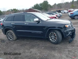 2014 Jeep Grand Cherokee Limited z VIN 1C4RJFBG0EC297746, wystawiony jako IAAI lot #41956879 z przebiegiem 212 106 mil mil oraz . Historia ofert i sprzedaży dostępna na DreamBid. Obrazek 14.