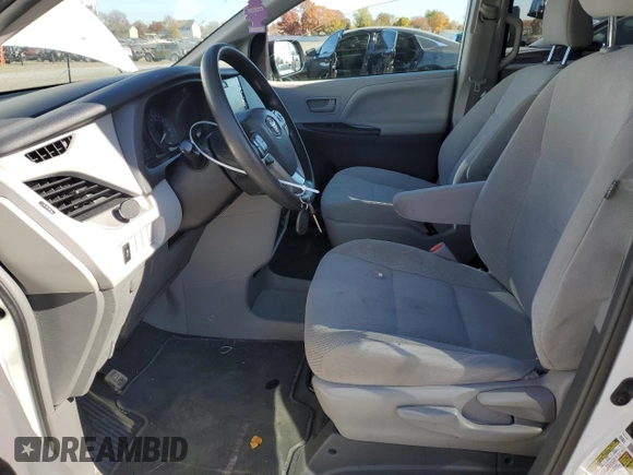 2019 Toyota Sienna L with VIN 5TDZZ3DC6KS995130, listed as a Copart auction lot 77712554 with 71,057 mi miles and Salvage Title. Bid and sale history available at carsss.com. Image 7.