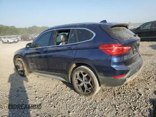 2017 BMW X1 sDrive28i with VIN WBXHU7C39H5H35490, listed as a Copart auction lot 75499974 with 0 mi miles and Salvage Title. Bid and sale history available at carsss.com. Image 2.