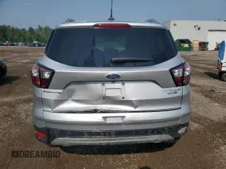 2018 Ford Escape Titanium с VIN 1FMCU9J9XJUD44928, выставлен на аукционе Copart как лот 59675445 с пробегом 37 485 миль миль и Чистый • Clean title. История ставок и продаж доступна на DreamBid. Изображение 6.