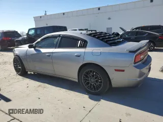 2013 Dodge Charger RT Plus with VIN 2C3CDXDTXDH687380, listed as a Copart auction lot 42055865 with 105,716 mi miles and Salvage Title. Bid and sale history available at carsss.com. Image 2.