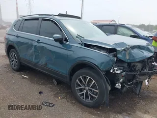 2019 Volkswagen Tiguan SE with VIN 3VV2B7AX8KM095836, listed as a IAAI auction lot 42417608 with 112,220 mi miles and . Bid and sale history available at DreamBid. Image 1.