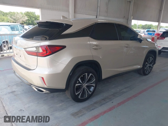 2016 Lexus RX 350 z VIN 2T2ZZMCA7GC026812, wystawiony jako IAAI lot #42470092 z przebiegiem 49 426 mil mil oraz . Historia ofert i sprzedaży dostępna na DreamBid. Obrazek 4.