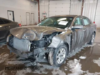 2017 Kia Optima LX with VIN 5XXGT4L33HG148897, listed as a IAAI auction lot 41565592 with 61,471 mi miles and . Bid and sale history available at carsss.com. Image 12.