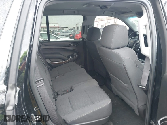 2016 Chevrolet Tahoe LS z VIN 1GNSCAEC8GR387676, wystawiony jako IAAI lot #41774142 z przebiegiem 36 695 mil mil oraz . Historia ofert i sprzedaży dostępna na DreamBid. Obrazek 8.