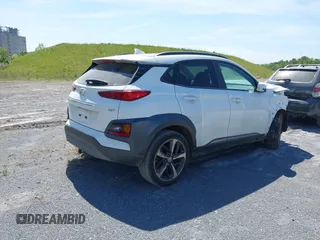 2021 Hyundai Kona Limited with VIN KM8K33A59MU731645, listed as a IAAI auction lot 41610100 with 33,572 mi miles. Bid and sale history available at carsss.com. Image 4.