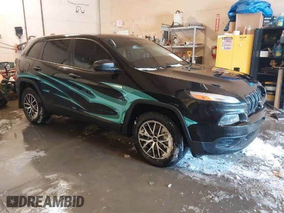 2015 Jeep Cherokee Sport with VIN 1C4PJMAB6FW773953, listed as a IAAI auction lot 41565879 with 242,580 mi miles. Bid and sale history available at carsss.com. Image 1.