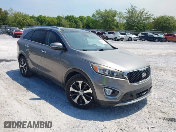 2018 Kia Sorento EX z VIN 5XYPH4A57JG410055, wystawiony jako IAAI lot #42023771 z przebiegiem 53 984 mil mil oraz . Historia ofert i sprzedaży dostępna na DreamBid. Obrazek 1.